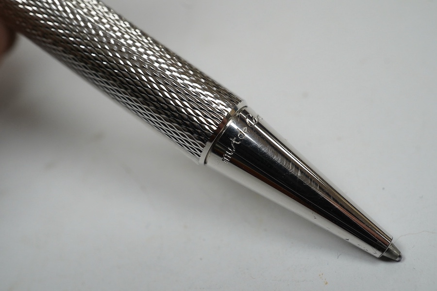 A Cartier pen, 14cm long, boxed. Condition - good